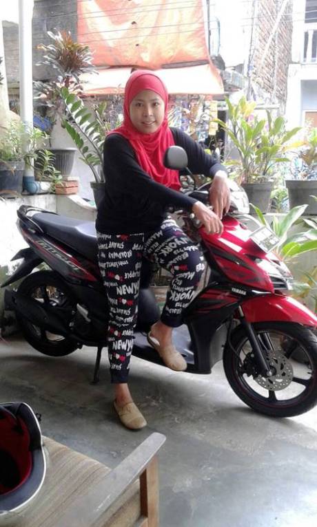 Ria Mulyaningsih dengan Mio GT yang membawanya jadi Milyarder Yamaha 40 Tahun Yamaha Indonesia