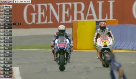 lorenzo and rossi change wet bike