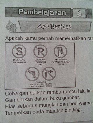 Penyesatan arti rambu lalu lintas dibuku ajar SD