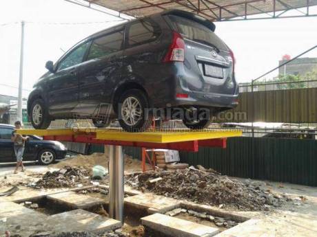 Mobil terjatuh dari Cuci Hidrolis  pertamax7.com 3