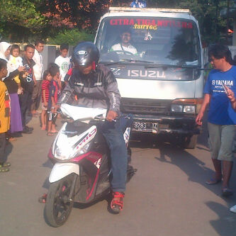 Yamaha Mio M3 Tarik Truk dalam ajang Uji Kekuatan Mio M3 Attack Kampung 001 pertamax7.com