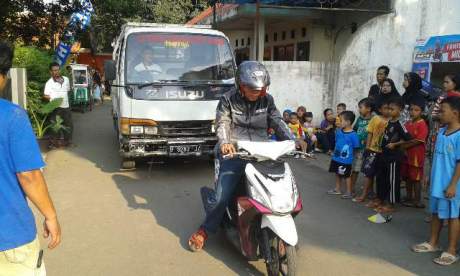 Yamaha Mio M3 Tarik Truk dalam ajang Uji Kekuatan Mio M3 Attack Kampung 002 pertamax7.com